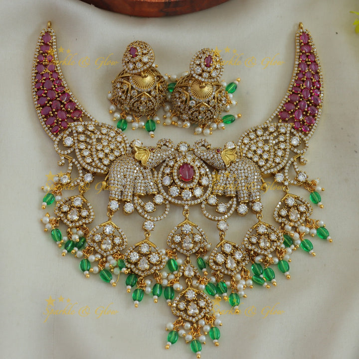 Beautiful Elephant and leaf design AD short necklace with ruby pearls and green beads