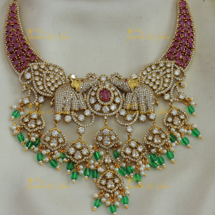Beautiful Elephant and leaf design AD short necklace with ruby pearls and green beads
