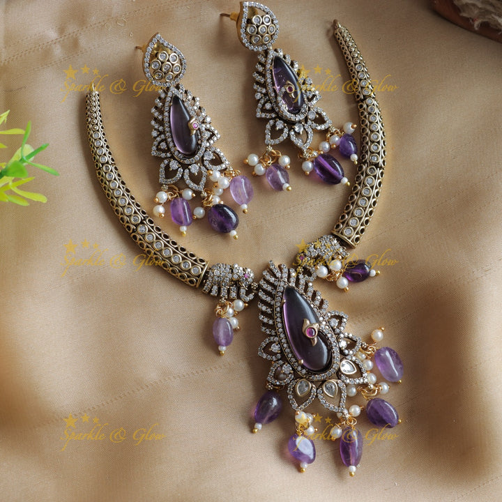Stunning Elephant and floral design AD short necklace with purple beads and stones