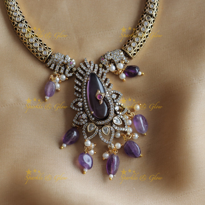 Stunning Elephant and floral design AD short necklace with purple beads and stones