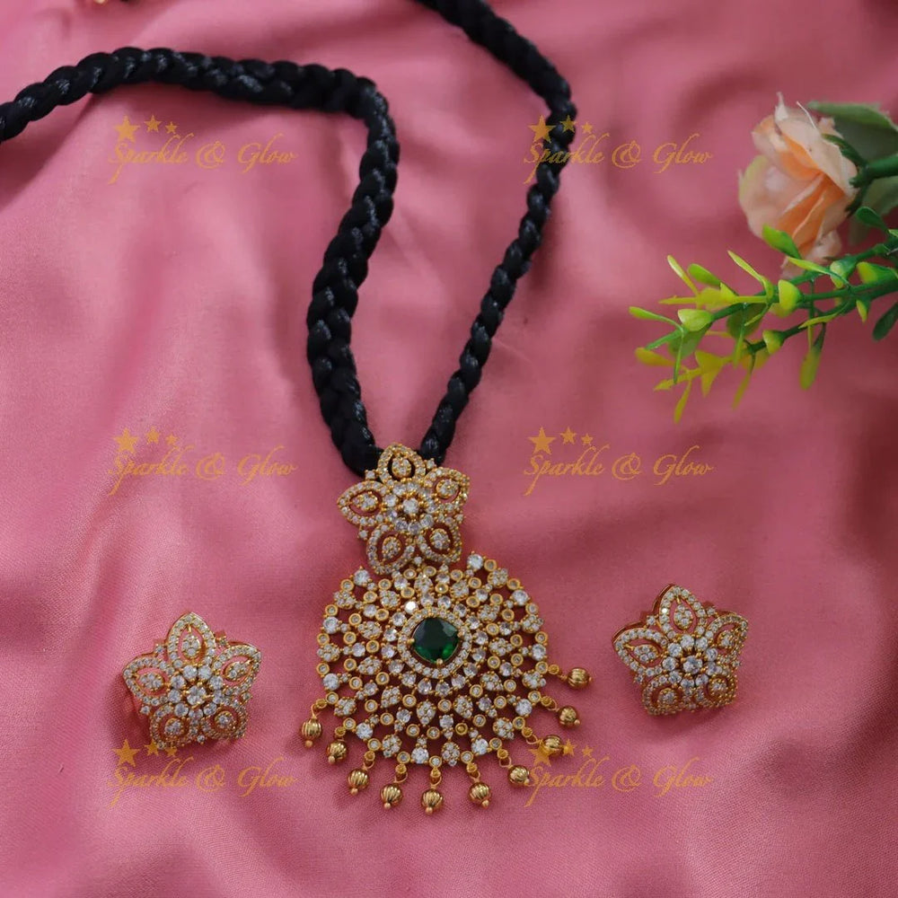 Elegant Floral pendant black thread short necklace with gold beads and ruby - Sparkle and Glow