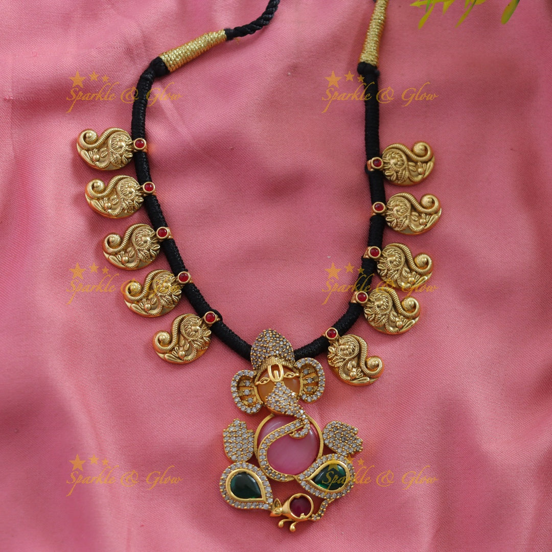 Beautiful Ganesha mango design black thread short necklace with multi colour stones