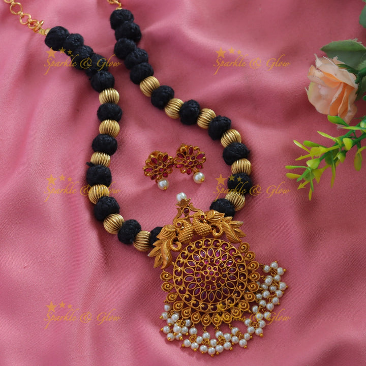 Stunning Peacock floral pendant black thread short necklace with ruby pearls and gold beads