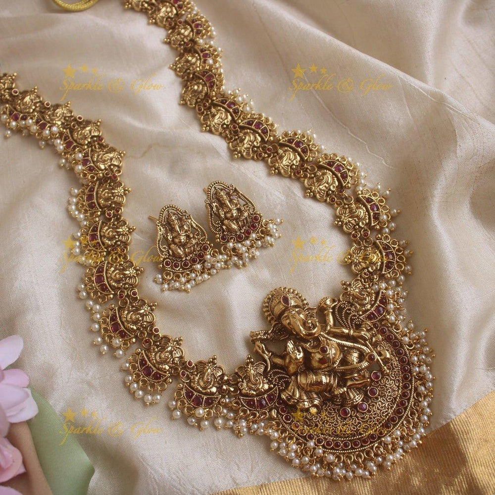 Stunning Ganesha carved long necklace with ruby stones and pearls - red pearl - Sparkle and Glow