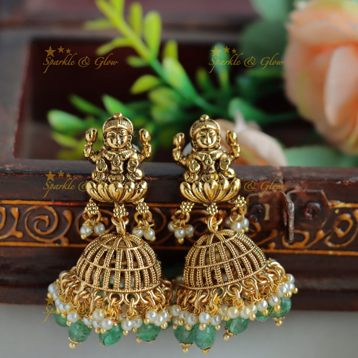 Stunning Lakshmi peacock carved coin short necklace with mint green beads