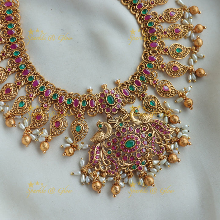 Stunning Peacock mango short necklace with ruby emerald rice pearls and gold beads