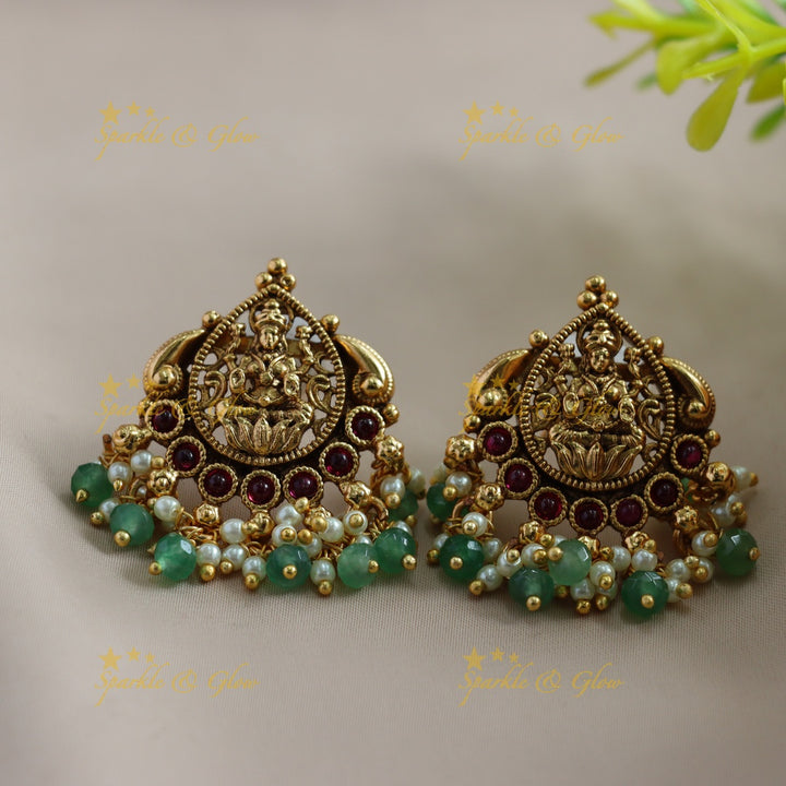 Statement Lakshmi Peacock carved choker with ruby, multi layer gold and mint green beads