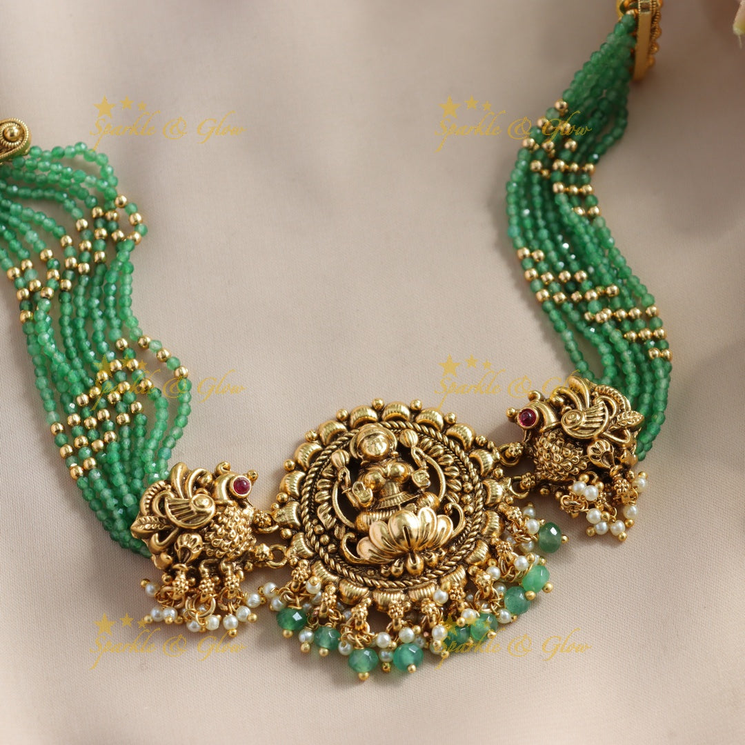 Statement Lakshmi Peacock carved choker with multi layer gold and mint green beads and pearls