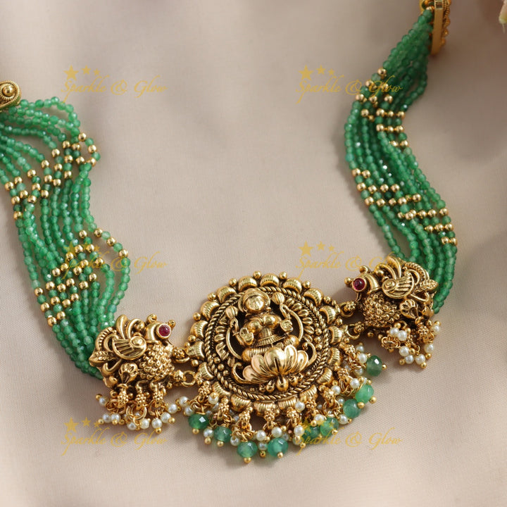 Statement Lakshmi Peacock carved choker with multi layer gold and mint green beads and pearls