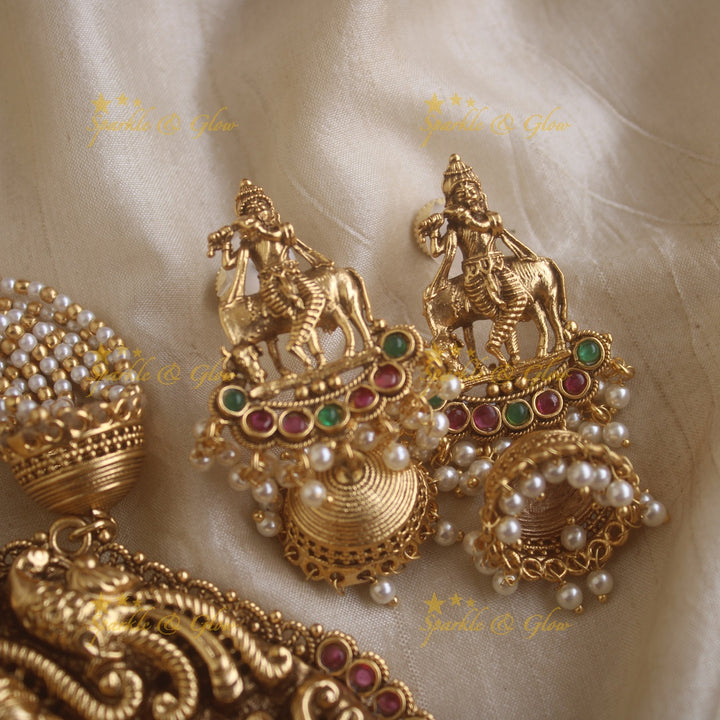 Statement Krishna playing flute and peacock carved haram with multi layer gold and pearl chain