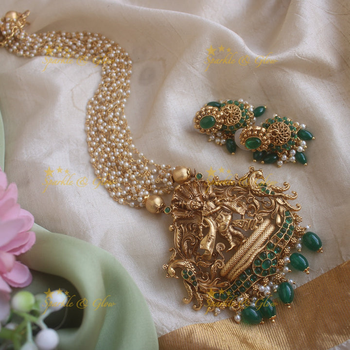 Exquisite Kalinga Mardhan Krishna carved pendant haram with emerald multi layer pearl chain and green beads