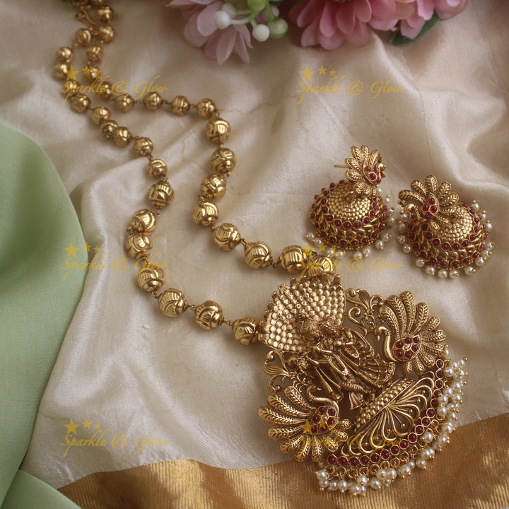 Stunnin Radha Krishna pendant gold beads haram with ruby stones and pearls