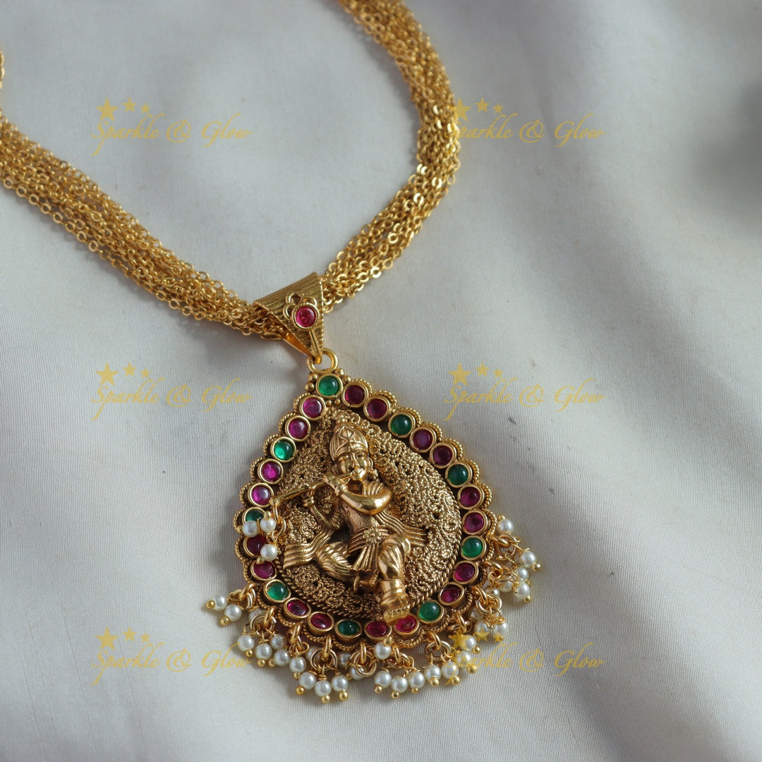 Stunning Krishna playing flue pendant chain haram with ruby emerald and pearls - Sparkle and Glow