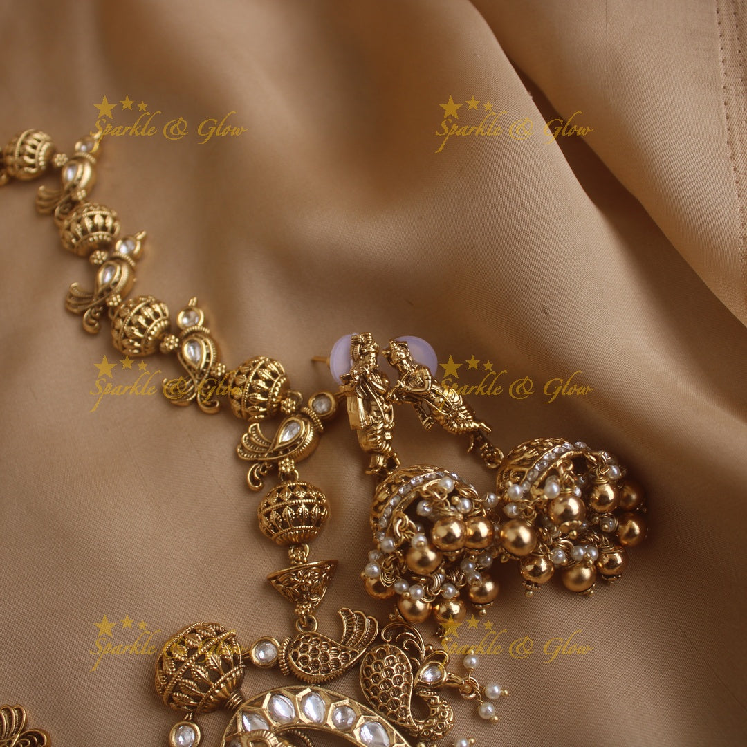 Elegant Krishna playing flute and parrot design long necklace with pearls and gold beads