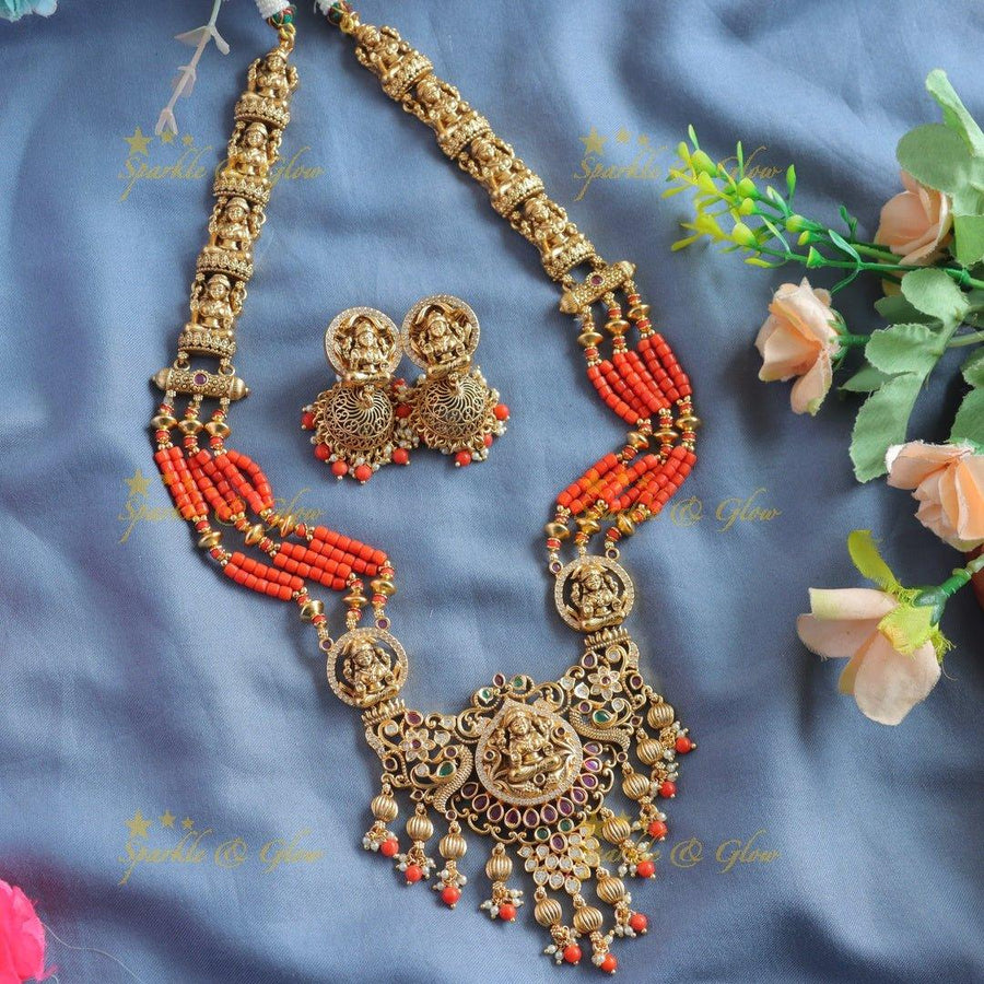 Stunning Lakshmi peacock carved pendant haram with multi layer orange beads, ruby and emeralds - Sparkle and Glow