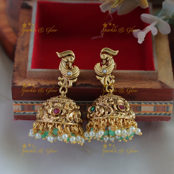 Beautiful Peacock carved long necklace with ruby emerald pearls and mint green beads