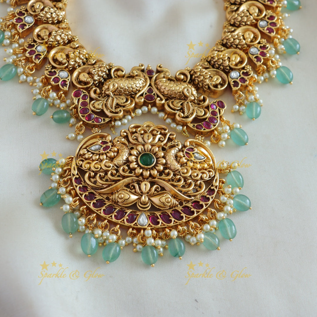 Stunning Peacock carved short necklace with ruby emerald pearls and mint green beads