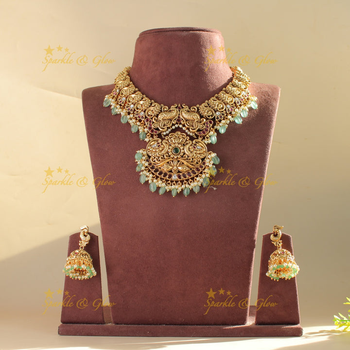 Stunning Peacock carved short necklace with ruby emerald pearls and mint green beads