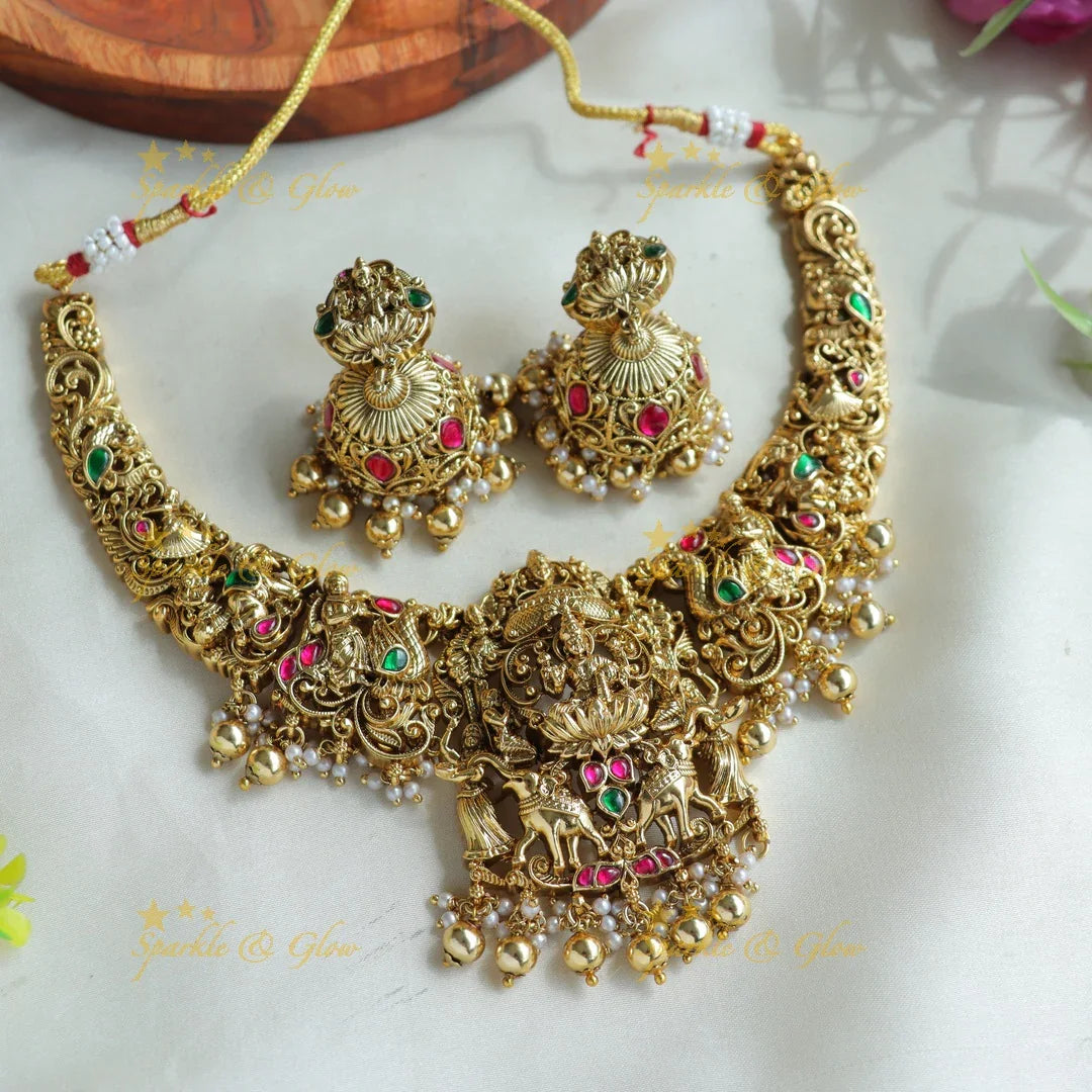 Beautiful Lakshmi Elephant peacock carved jadau short necklace with green beads - Sparkle and Glow