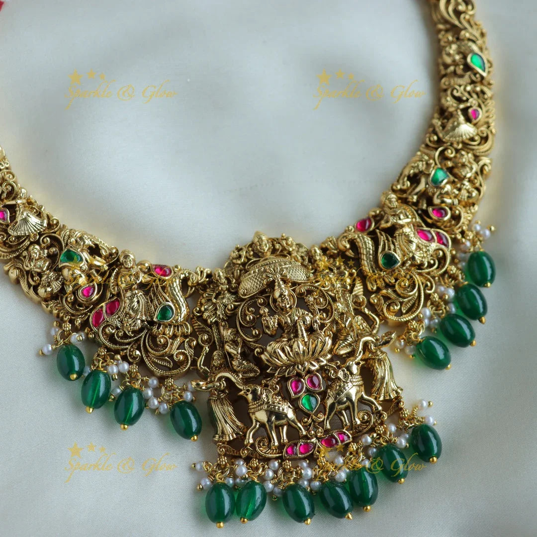 Beautiful Lakshmi Elephant peacock carved jadau short necklace with green beads - Sparkle and Glow