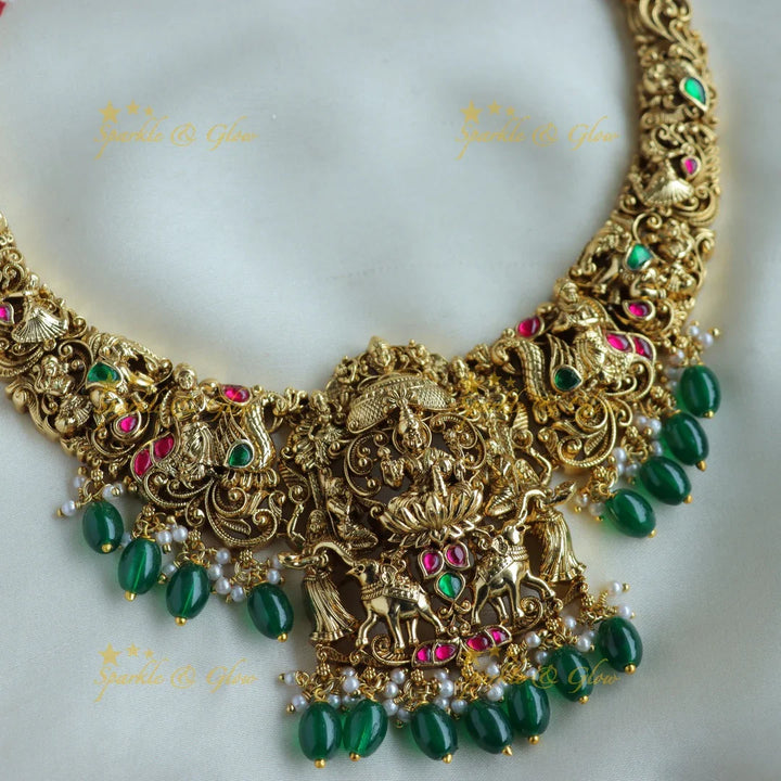 Beautiful Lakshmi Elephant peacock carved jadau short necklace with green beads - Sparkle and Glow