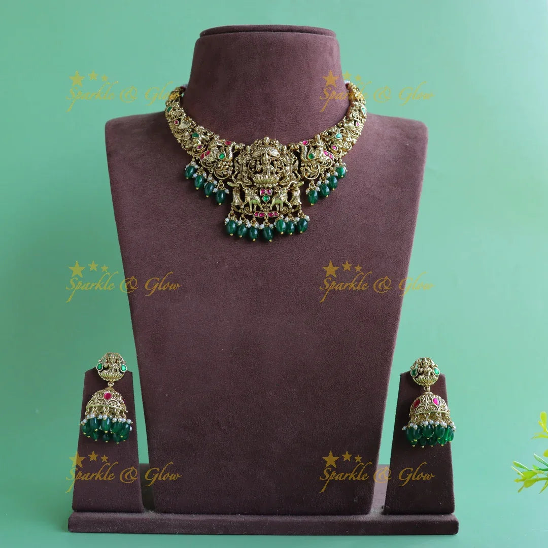 Beautiful Lakshmi Elephant peacock carved jadau short necklace with green beads - Sparkle and Glow