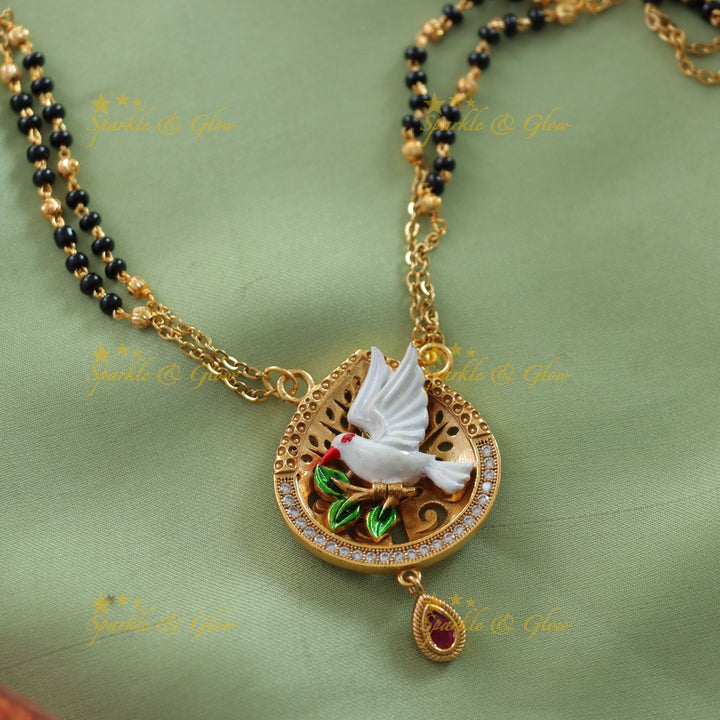 Statement Pigeon design pendant two layer black beads chain , mangalsutra with ruby and white stones