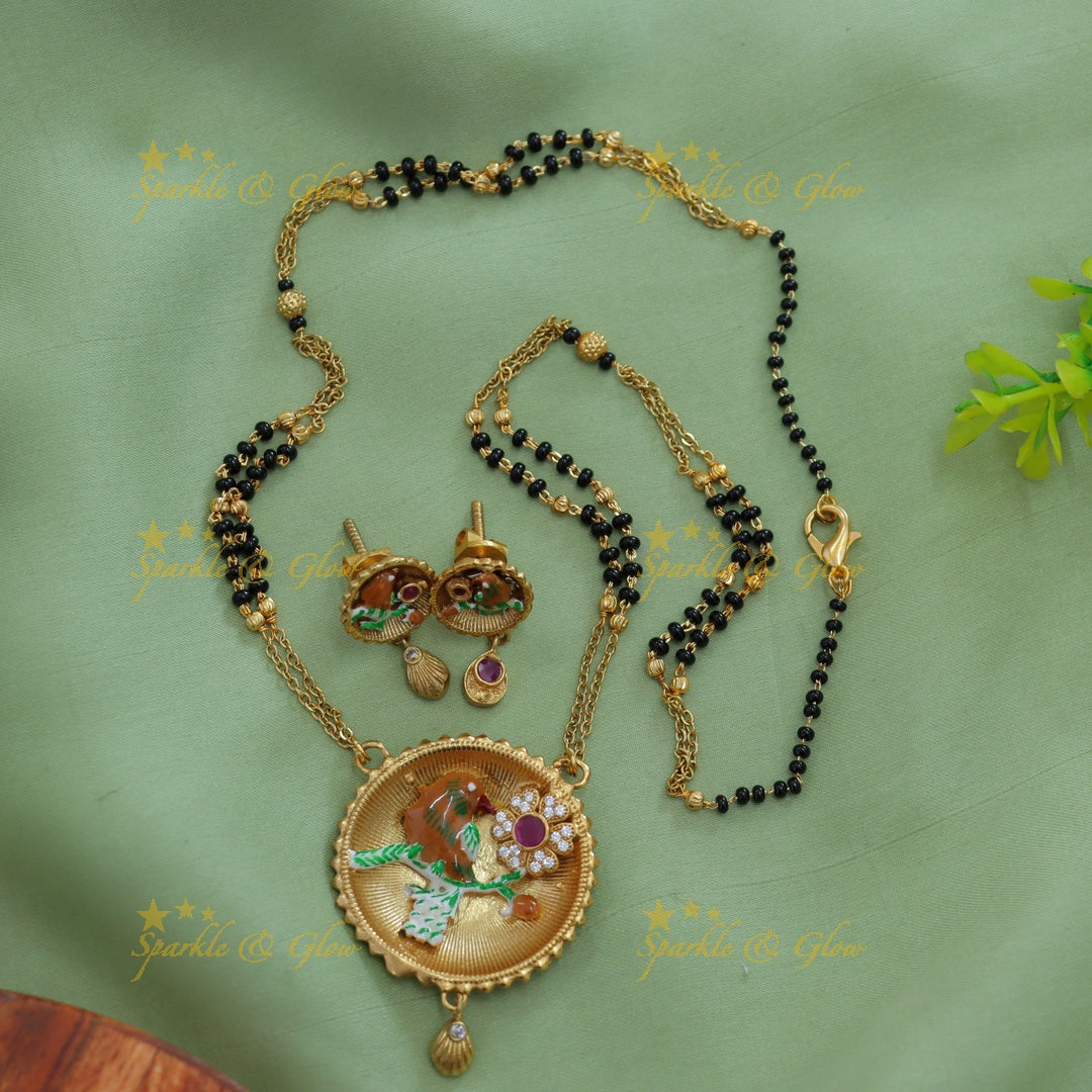 Statement Bird and floral design pendant two layer black beads chain , mangalsutra with ruby and white stones
