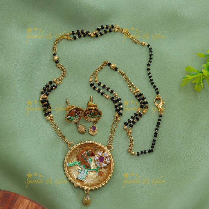 Statement Bird and floral design pendant two layer black beads chain , mangalsutra with ruby and white stones