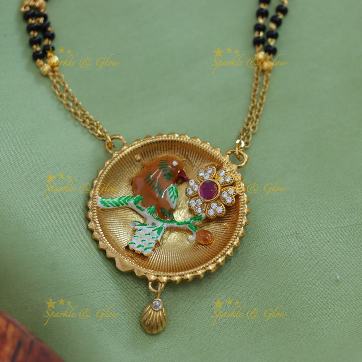 Statement Bird and floral design pendant two layer black beads chain , mangalsutra with ruby and white stones