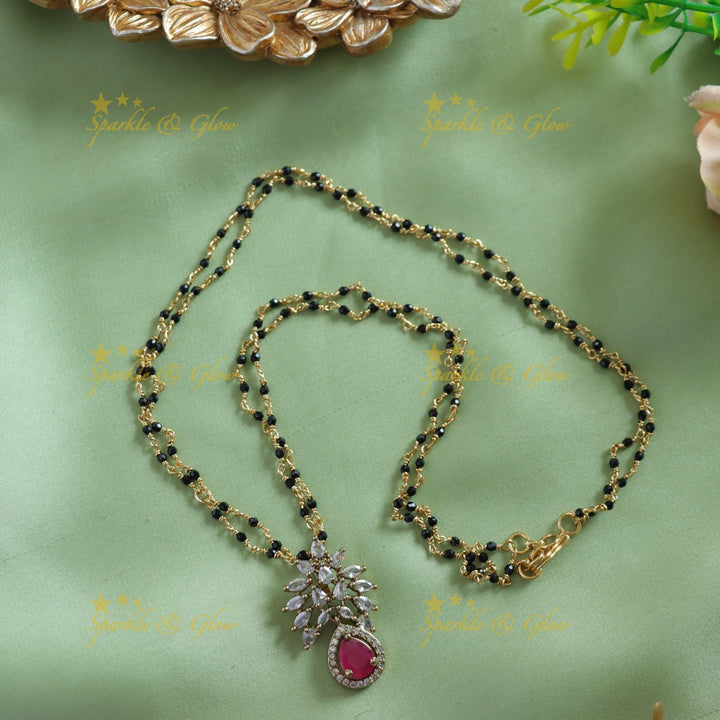 Stunning Leaf design stone pendant two layer black beads chain , mangalsutra with ruby - pink