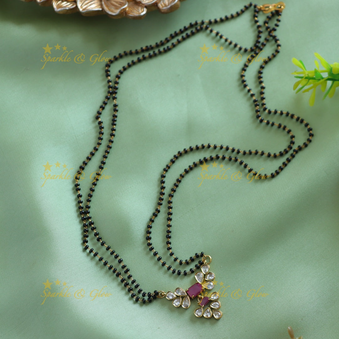 Beautiful Leaflet design stone pendant two layer black beads chain , mangalsutra - green