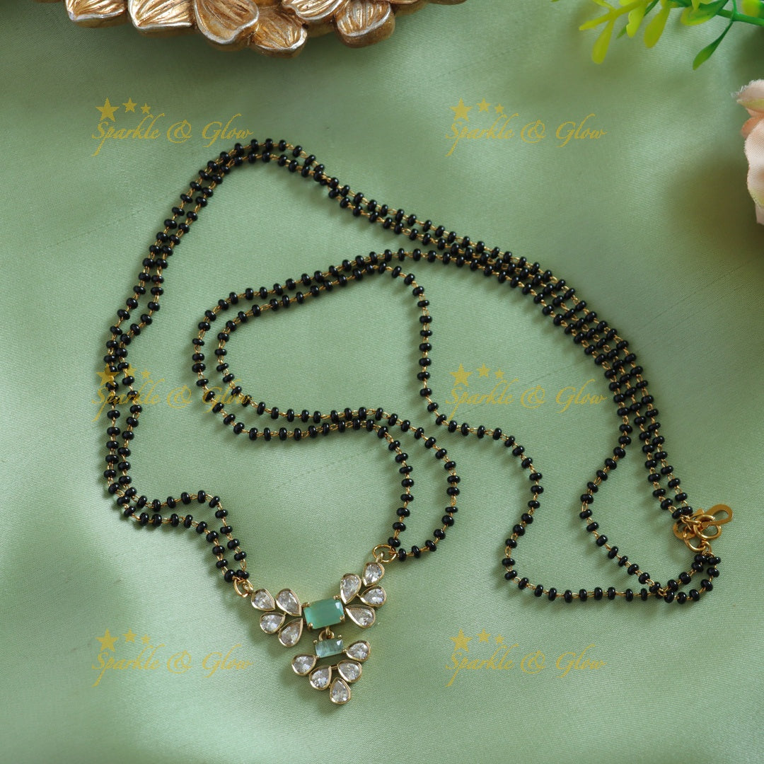 Beautiful Leaflet design stone pendant two layer black beads chain , mangalsutra - green pink
