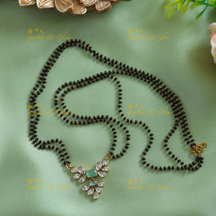 Beautiful Leaflet design stone pendant two layer black beads chain , mangalsutra - green pink