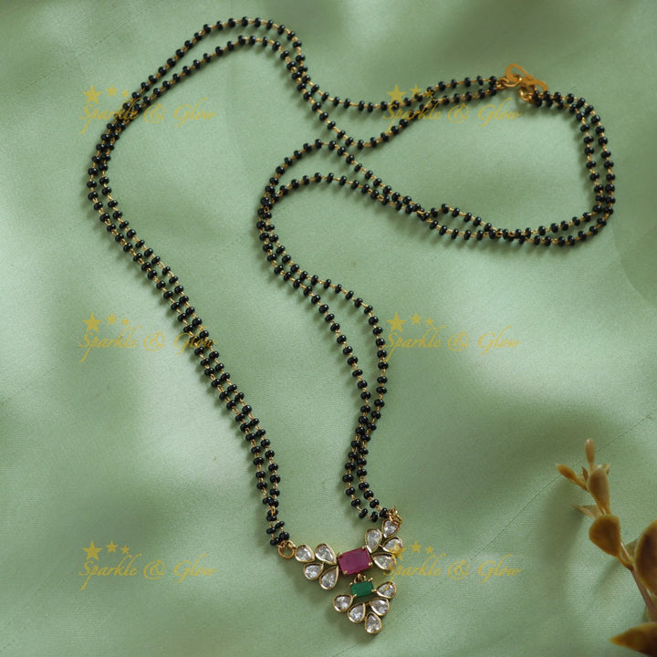 Beautiful Leaflet design stone pendant two layer black beads chain , mangalsutra - pink green
