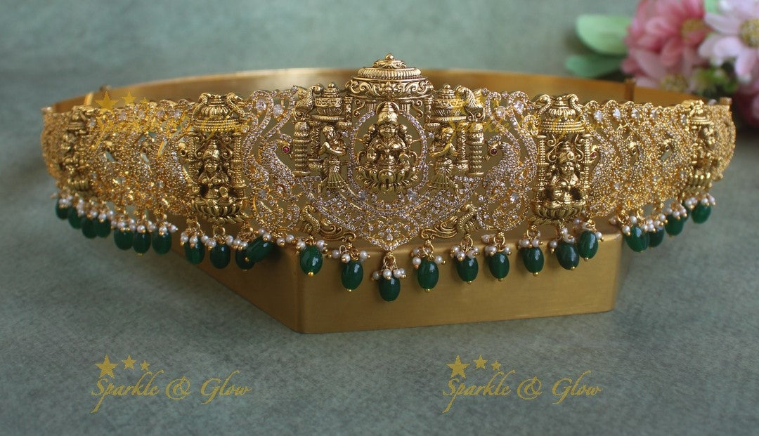 Grand Idol Lakshmi Peacock carved Hipbelt with Green beads and AD stones
