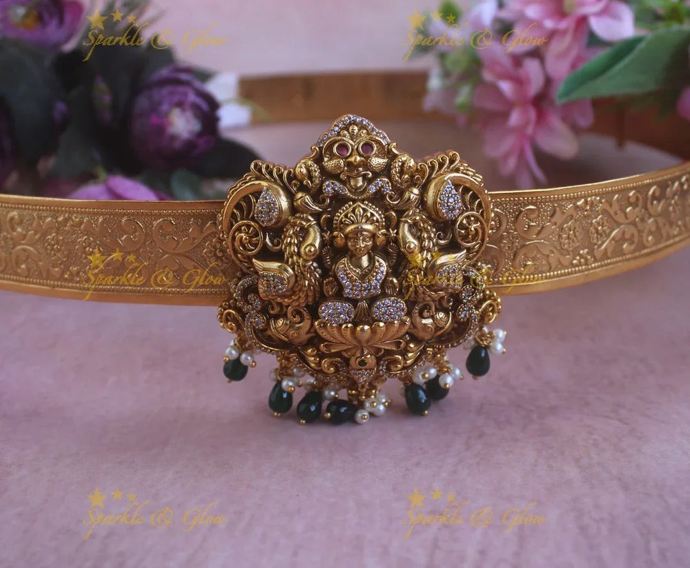 Elegant Idol Lakshmi Peacock pendant carved plain Hipbelt with Green beads - Sparkle and Glow