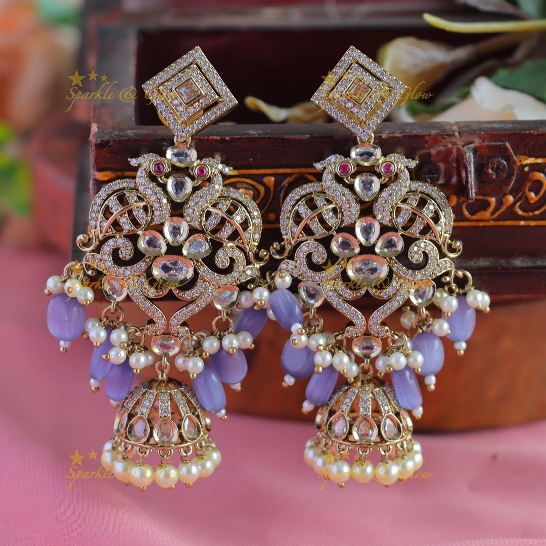 Gracious Dual tone Peacock carved Victorian AD earrings with jhumuka hanging