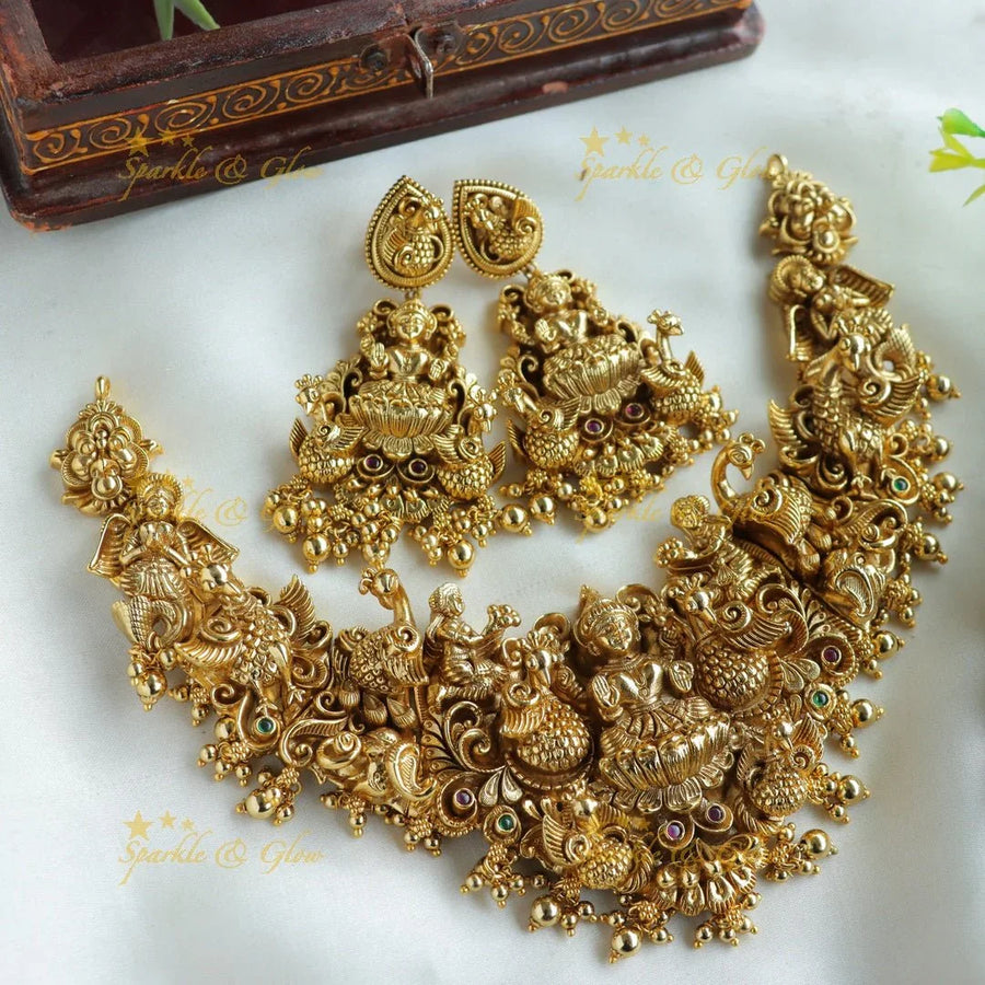 Grand Intricate Lakshmi Peacock carved short necklace with gold beads - Sparkle and Glow