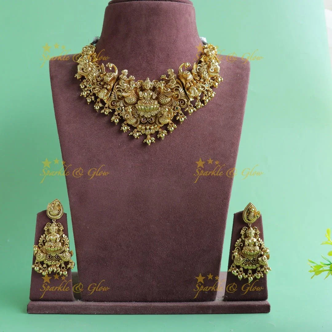 Grand Intricate Lakshmi Peacock carved short necklace with gold beads - Sparkle and Glow