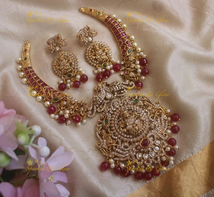 Sparkling Lakshmi Peacock Hasli Necklace with AD stones and Green beads - Sparkle and Glow