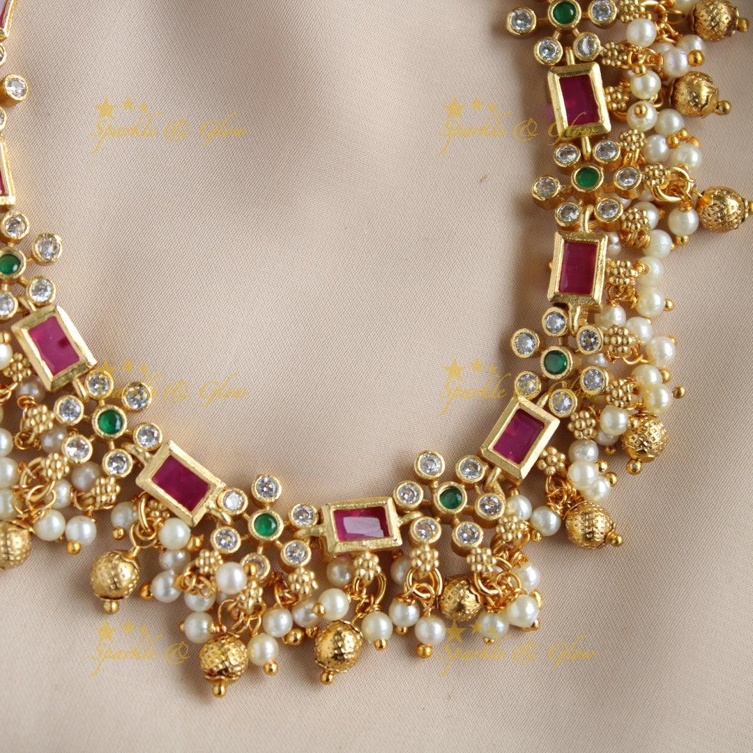 Statement Floral design gutta pusalu short necklace with ruby emerald and white stones - Sparkle and Glow