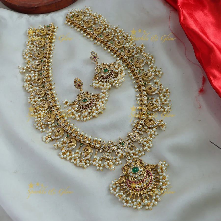 Gorgeous Mango peacock gutta pusalu haram with ruby emerald and CZ stones - Sparkle and Glow