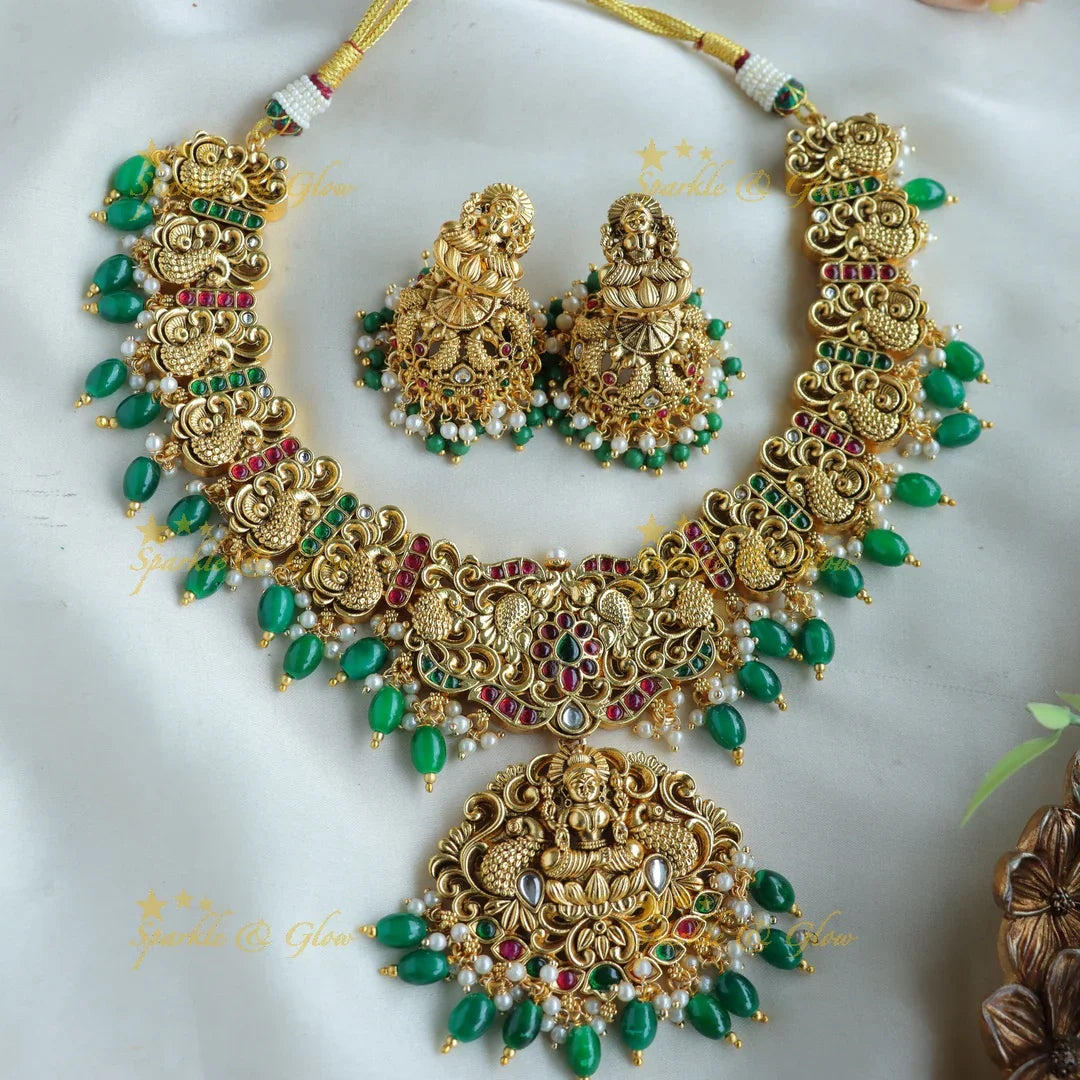 Beautiful Lakshmi peacock carved short necklace with ruby emerald and green beads - Sparkle and Glow