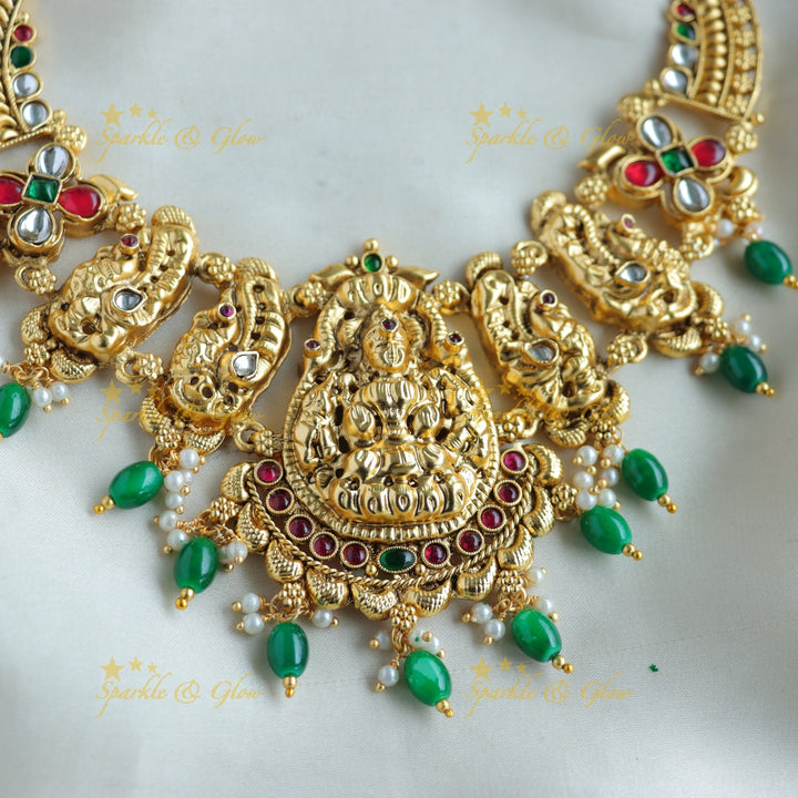 Exclusive Lakshmi peacock carved short necklace with ruby emerald pearls and green beads