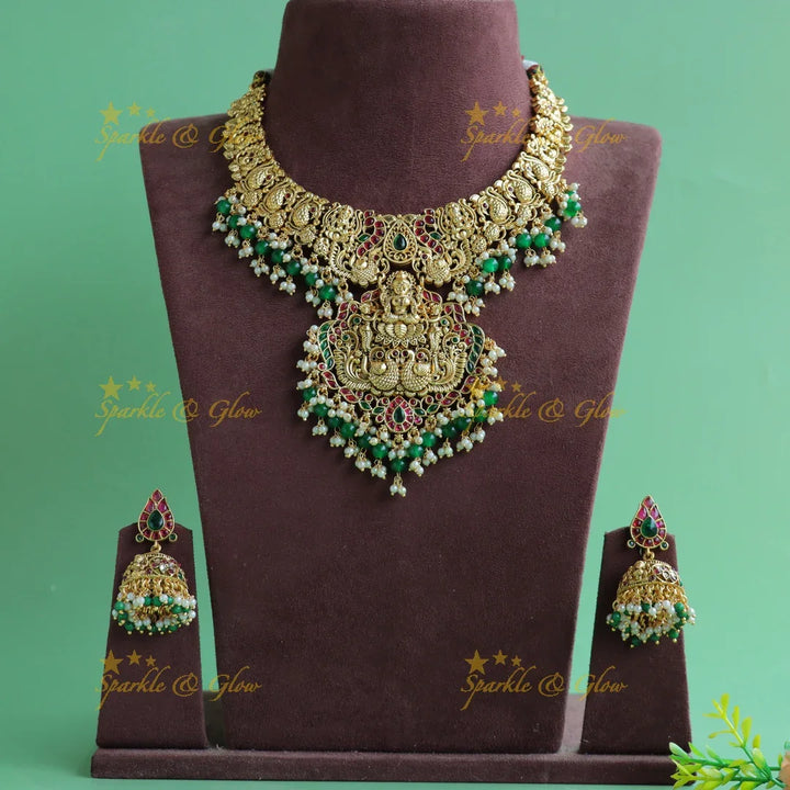 Statement Lakshmi peacock carved short necklace with ruby emerald and green beads - Sparkle and Glow