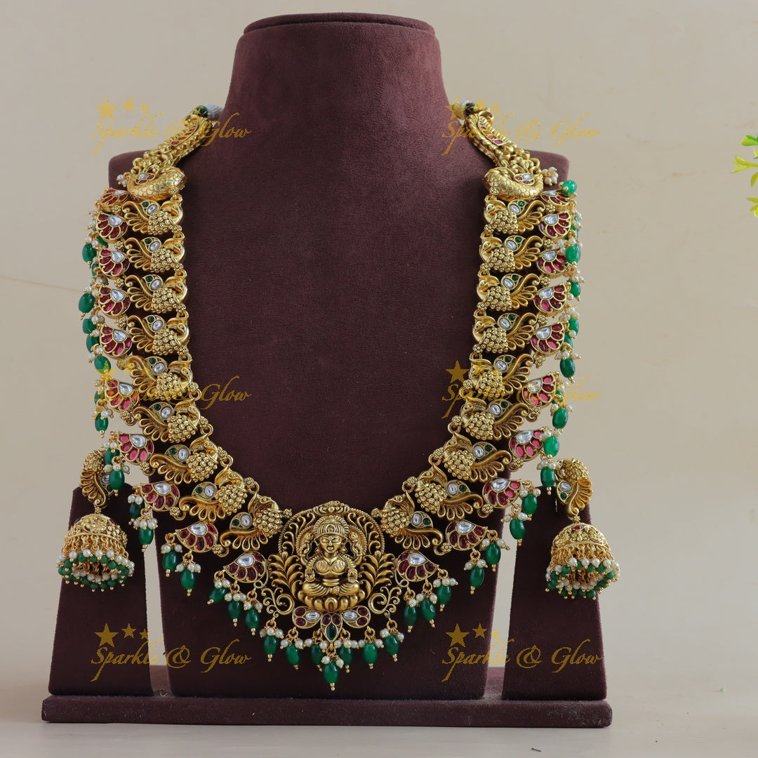 Exclusive Lakshmi peacock carved kemp stone long necklace with pearls and green beads