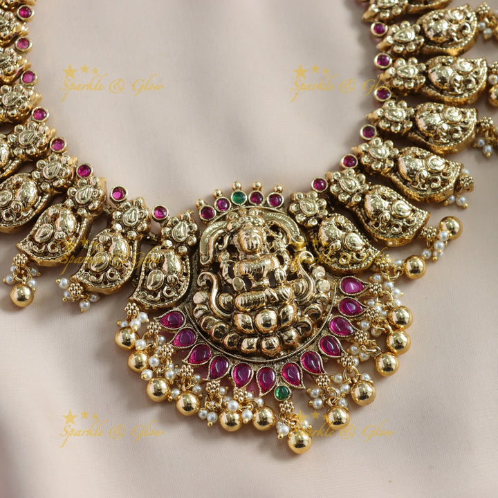 Beautiful Lakshmi carved mango short necklace with ruby stones gold beads - red gold