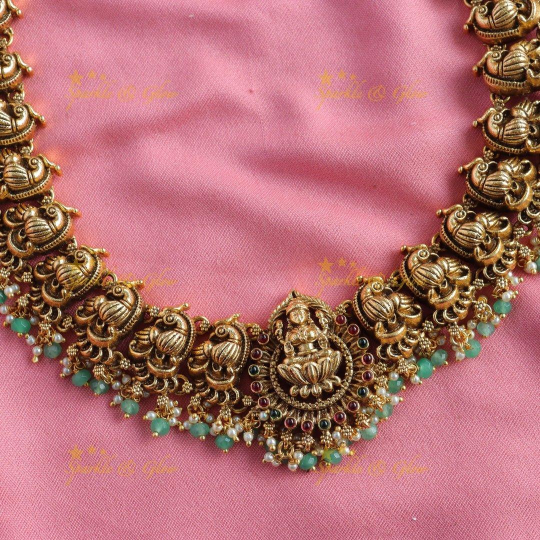 Grand Intricate Lakshmi peacock carved long necklace with gold beads - Sparkle and Glow