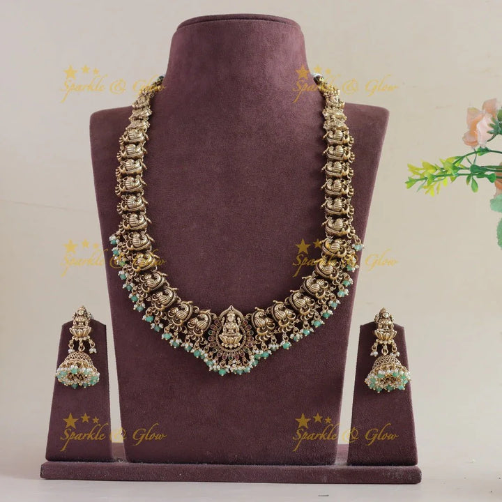 Grand Intricate Lakshmi peacock carved long necklace with gold beads - Sparkle and Glow